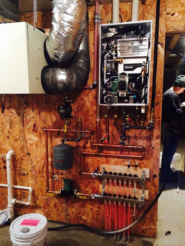 In-floor heat manifold system